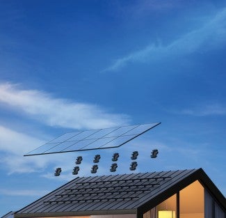 roof with microinverters and solar panels hover above
