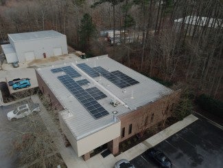 Aerial view of solar panels installed on a building